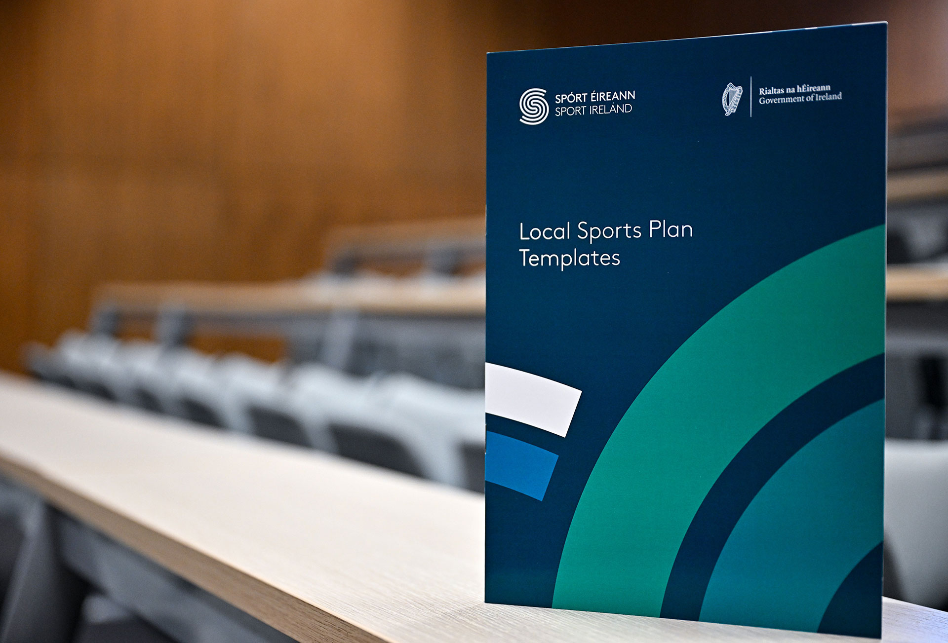 Local Sports Plan booklet stranding upright on a table.
